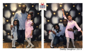 A photo of a family posing for the Daddy Daughter 2019 event.
