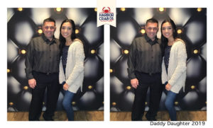 A photo of a father and daughter smiling for the Daddy Daughter 2019 event.