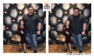 A photo of a father and daughter smiling for the Daddy Daughter 2019 event.
